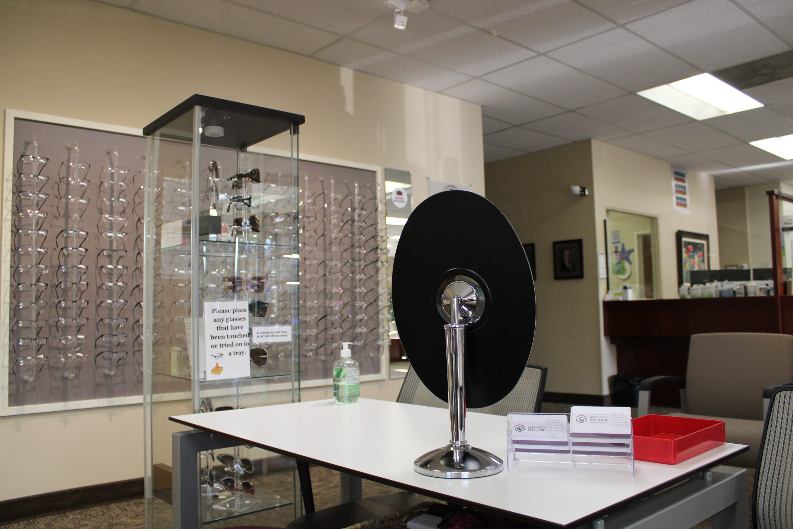 Ophthalmology specialist diagnosing a patient